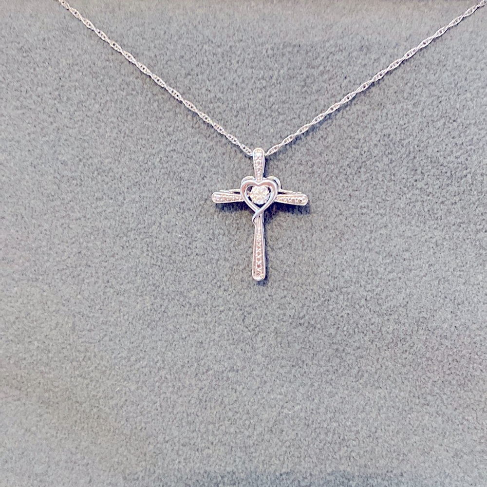 Diamond Cross Necklace from Kay Jewelers with floating diamond